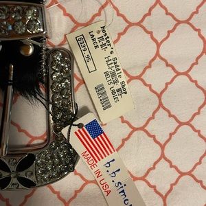 Real leather, and swarovski crystal embellished belt with orginal tags